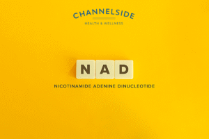 Letters NAD on a yellow background