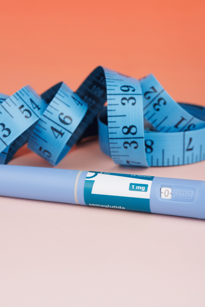 GLP-1 injection with a measuring tape in the background.