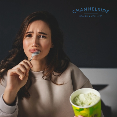 woman eating ice cream upset-stress eating.
